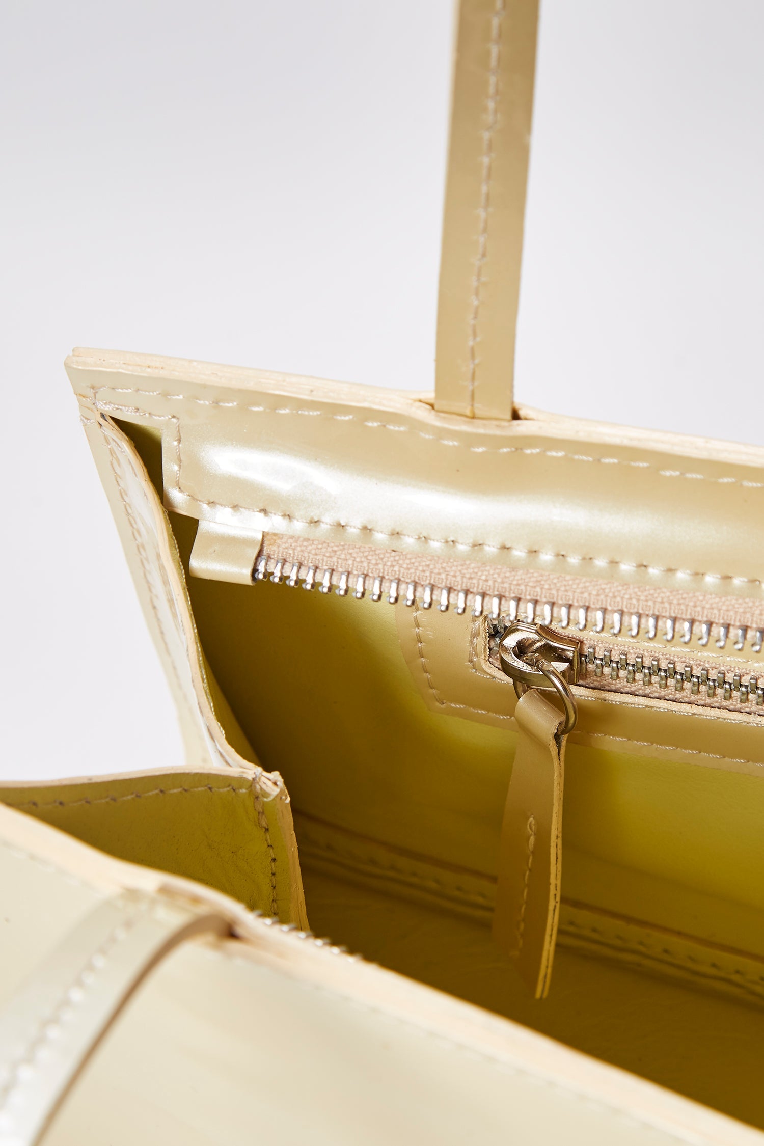 Close-up of the hotdog sand bag in a white background. 100% made from deadstock leather.