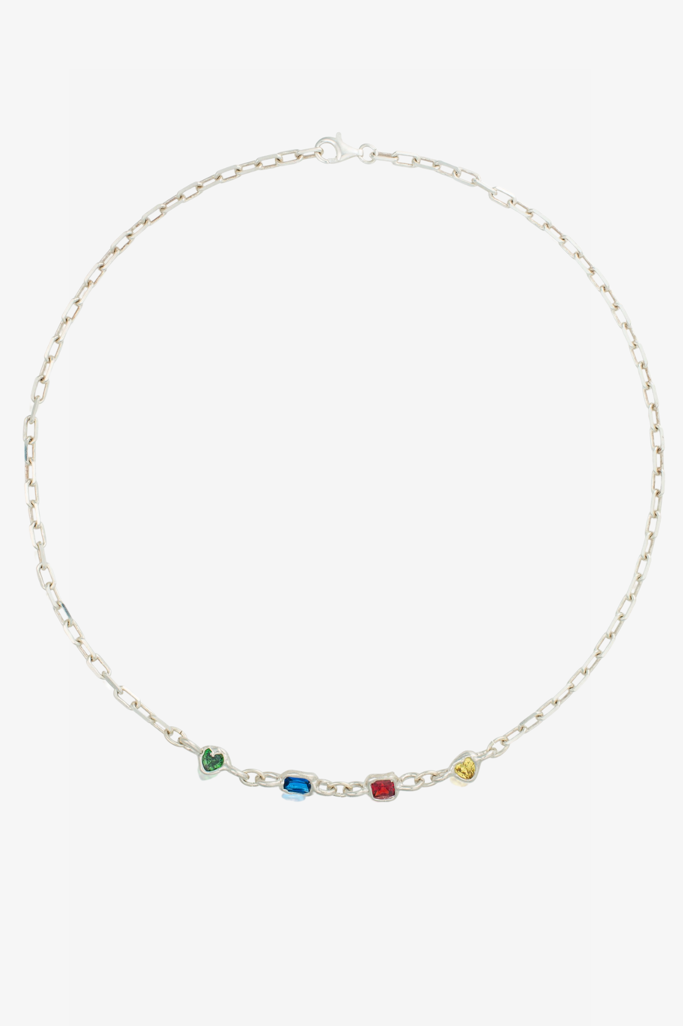 The lala necklace in a white background. Made from 100% recycled metals and lab created gemstones.