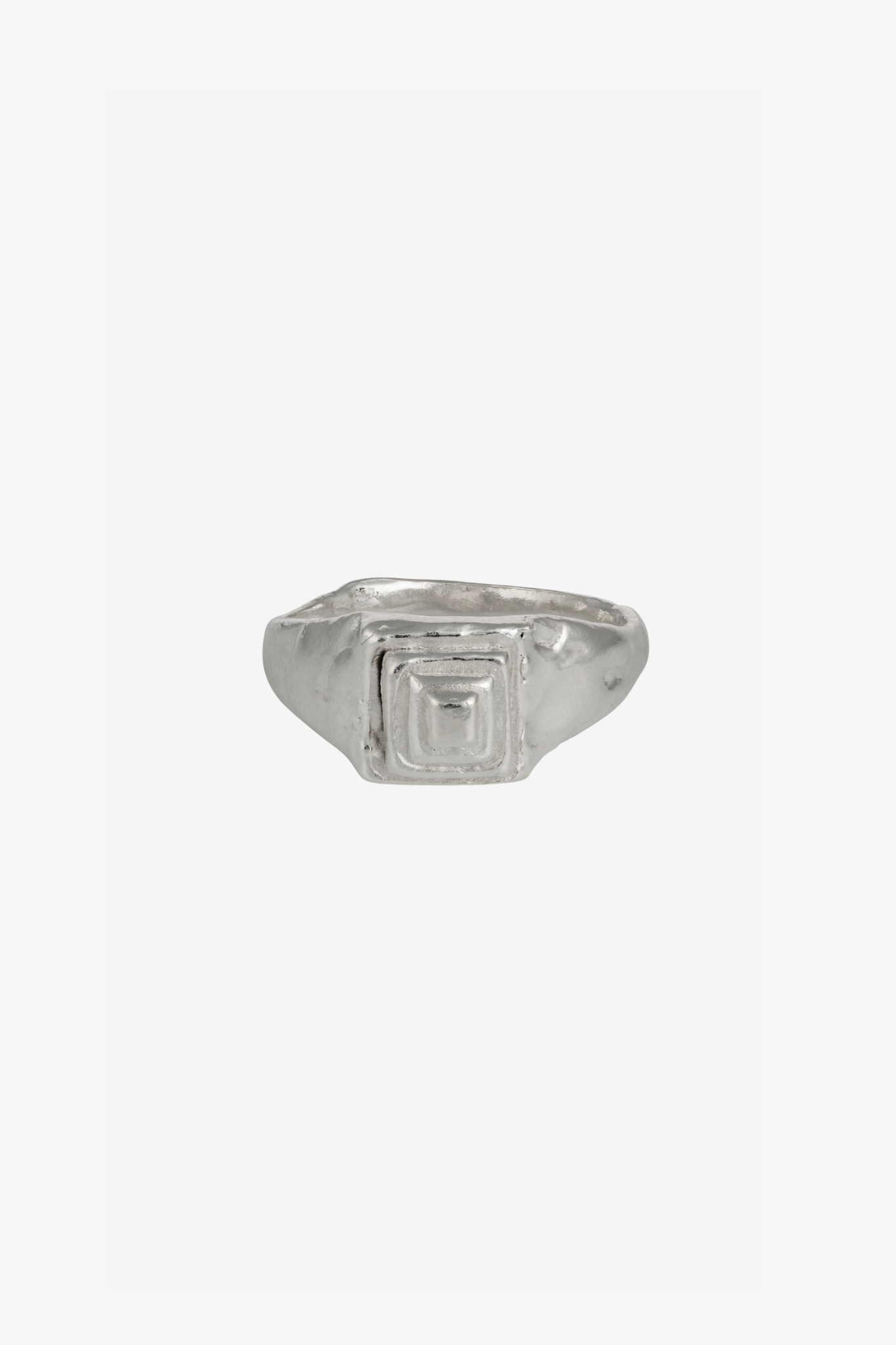 The silver pentahedron ring in a white background. Made from 100% recycled metals and lab created gemstones.