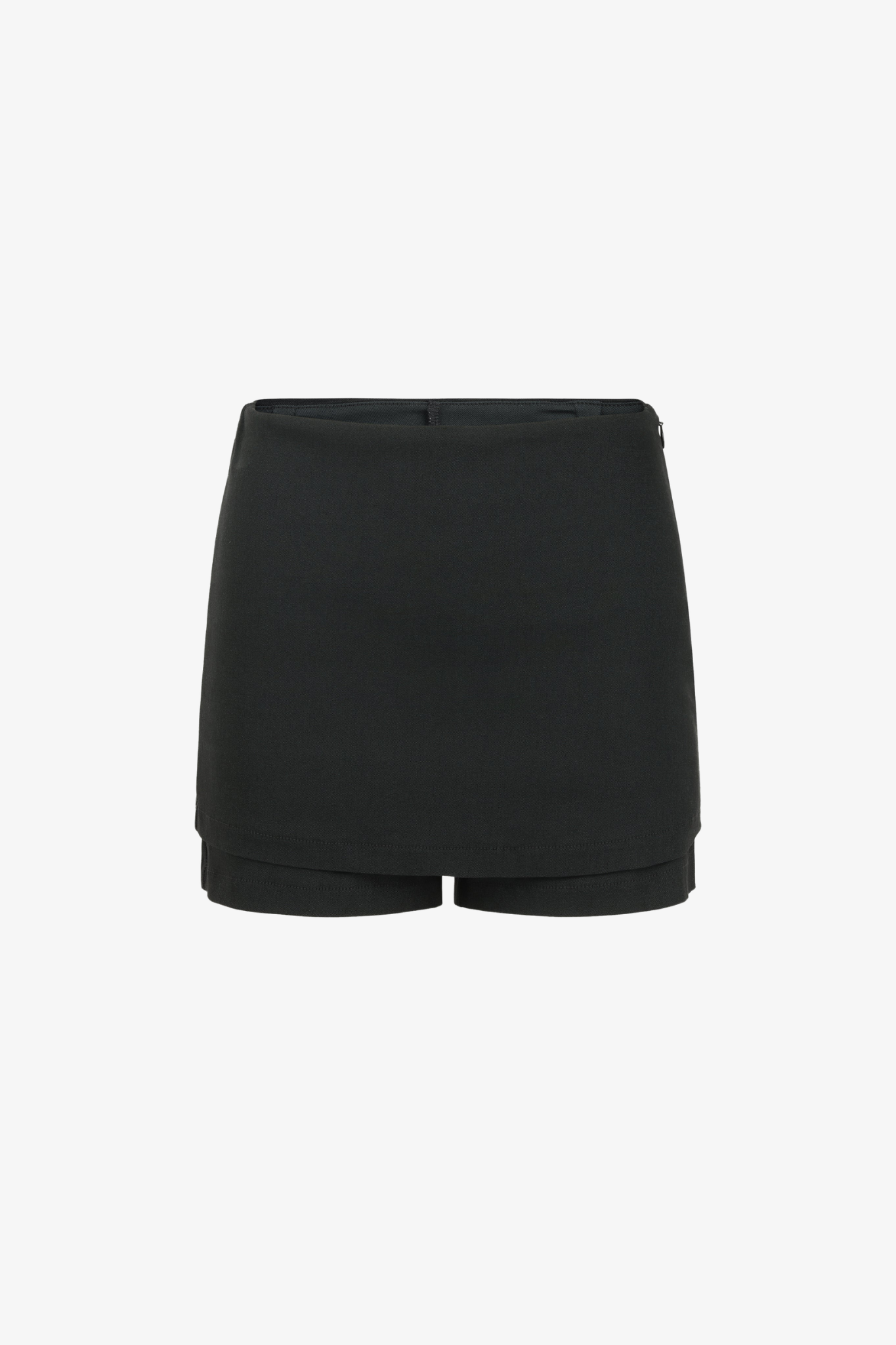 The porto mini skort in a white background. Made in Los Angeles