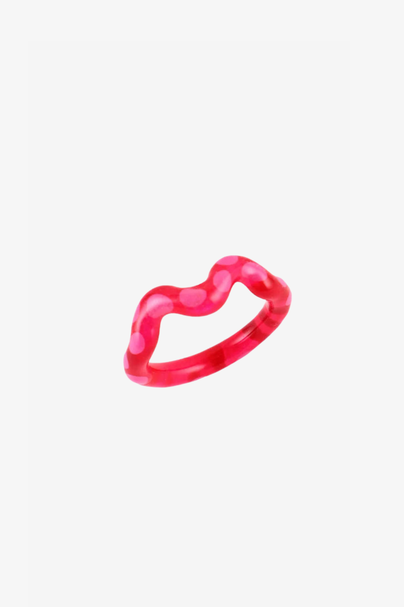 The single wave raspberry ring in a white background. Charm are 3D printed and hand finished. Made in New York. 